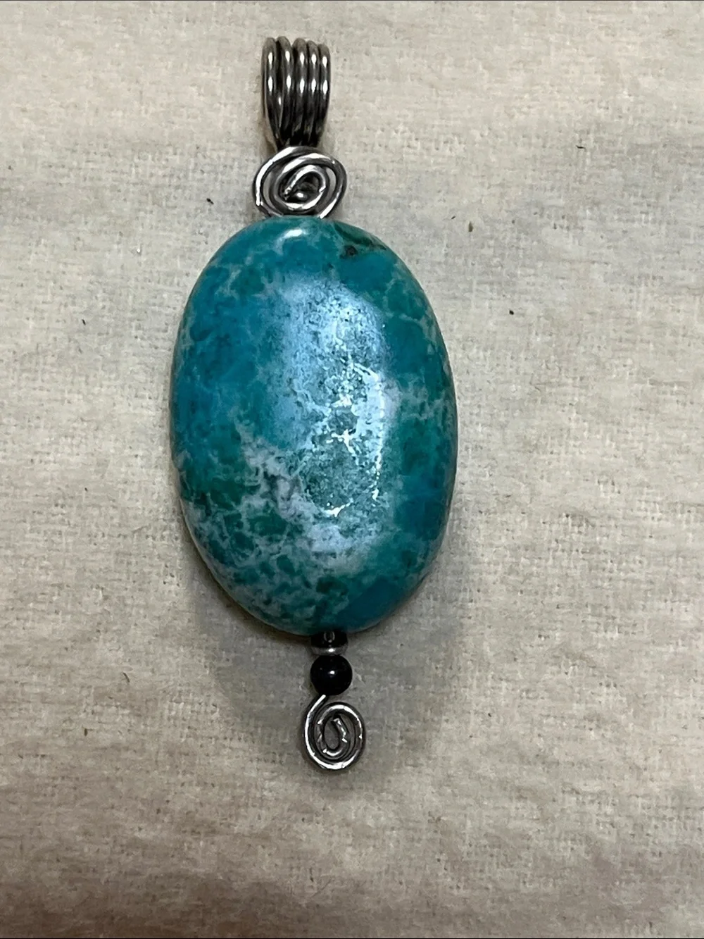 Turquoise Blue Oval Stone Pendant Necklace with Silver Spiral Accents